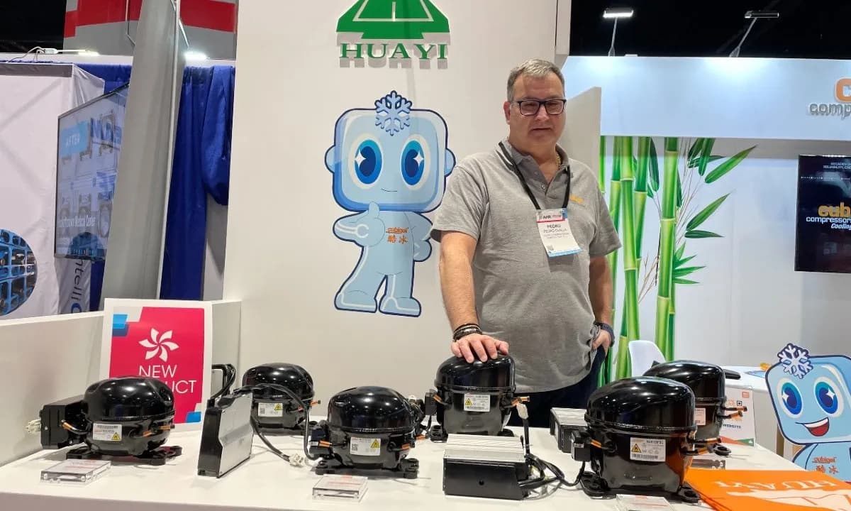 Pedro Olalla, Huayi Compressor Barcelona, presenting the company's variable-speed compressors at AHR Expo 2024 in Chicago