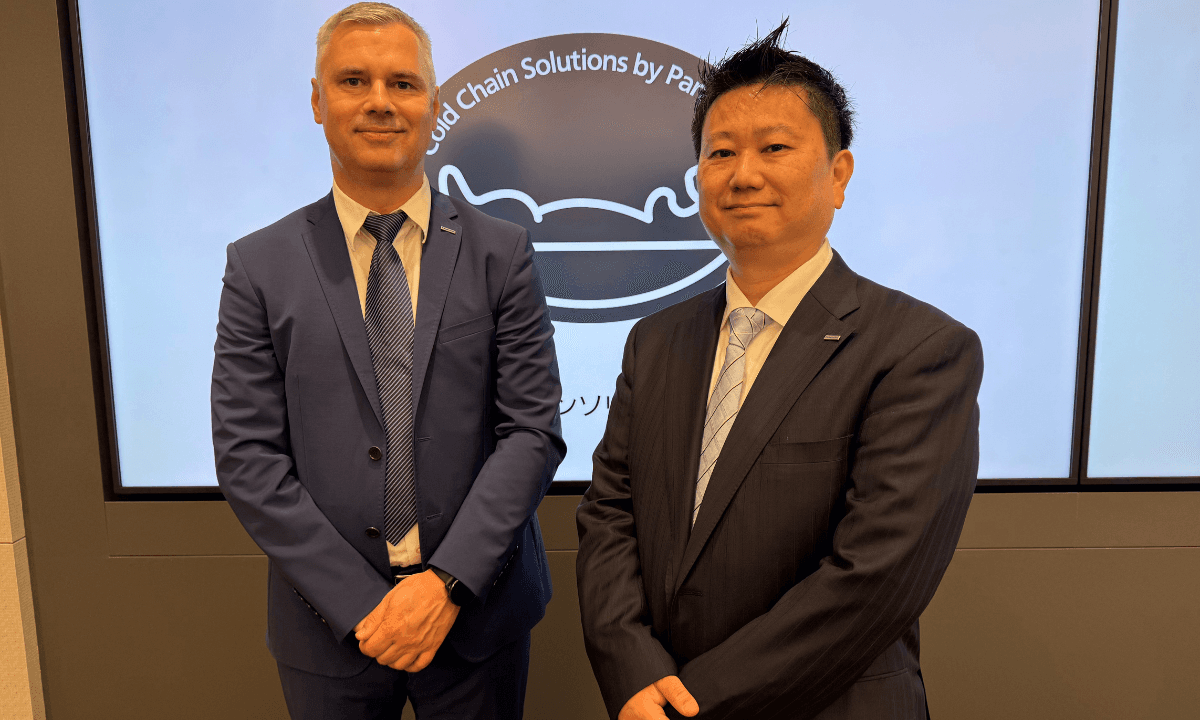 A graphic depicting Panasonic Cold Chain Poland Managing Director Gaku Shimada and General Manager Pawel Jankowski. The interview focuses on Panasonic's CO2 outdoor condensing unit sales growth in Europe.